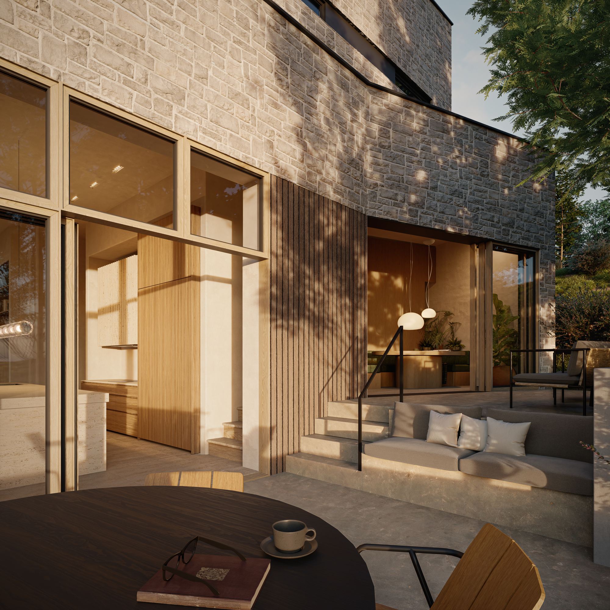 The Hill House | Anonymous Architecture | Dining and breakfast terrace with stepped seating against the stone facade